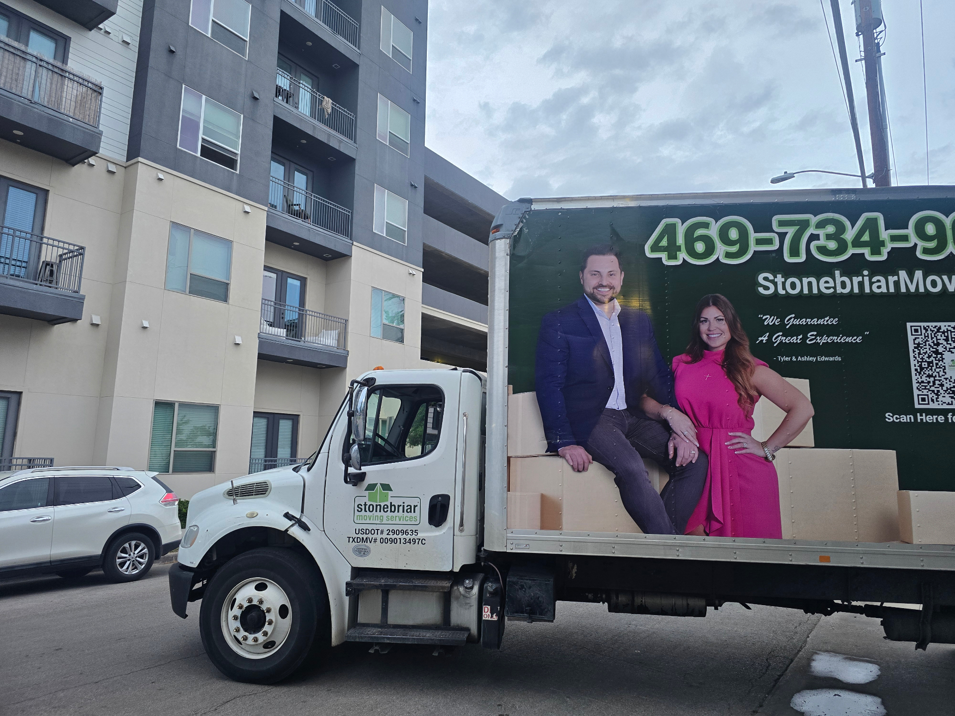 Stonebriar truck outside an Uptown Dallas apartment building
